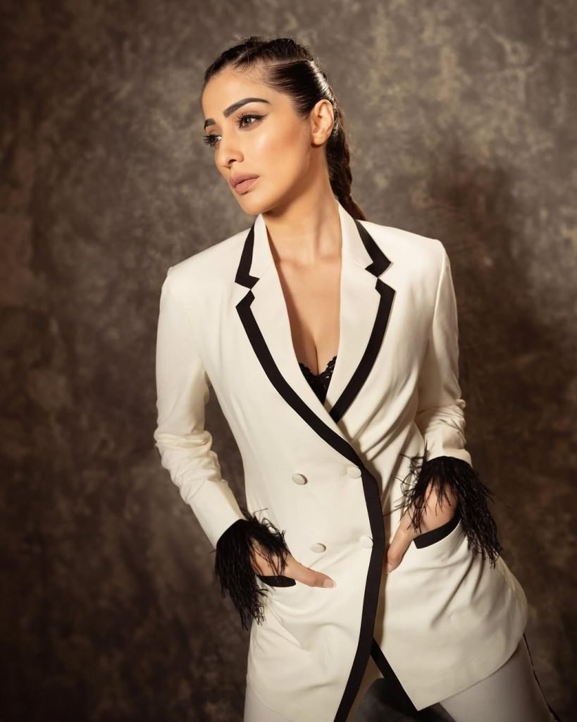 Elegant white ensemble showcases Lakshmi's refined taste in fashion