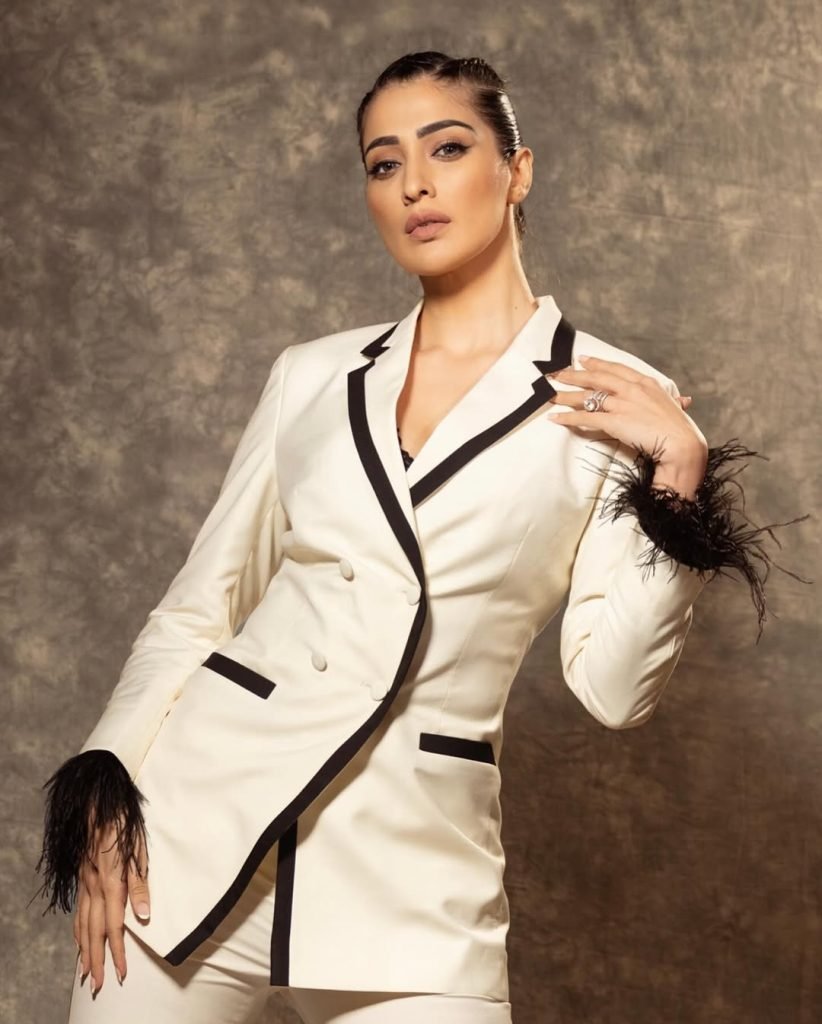 Sophisticated white dress epitomizes timeless elegance and grace for Lakshmi