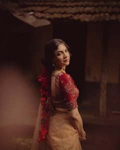 Madonna Sebastian embodies bridal beauty in red ensemble with statement gold jewelry