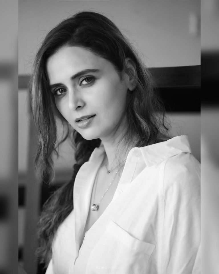 Crisp white shirt creates professional yet relaxed styling statement for Meenakshi Dixit