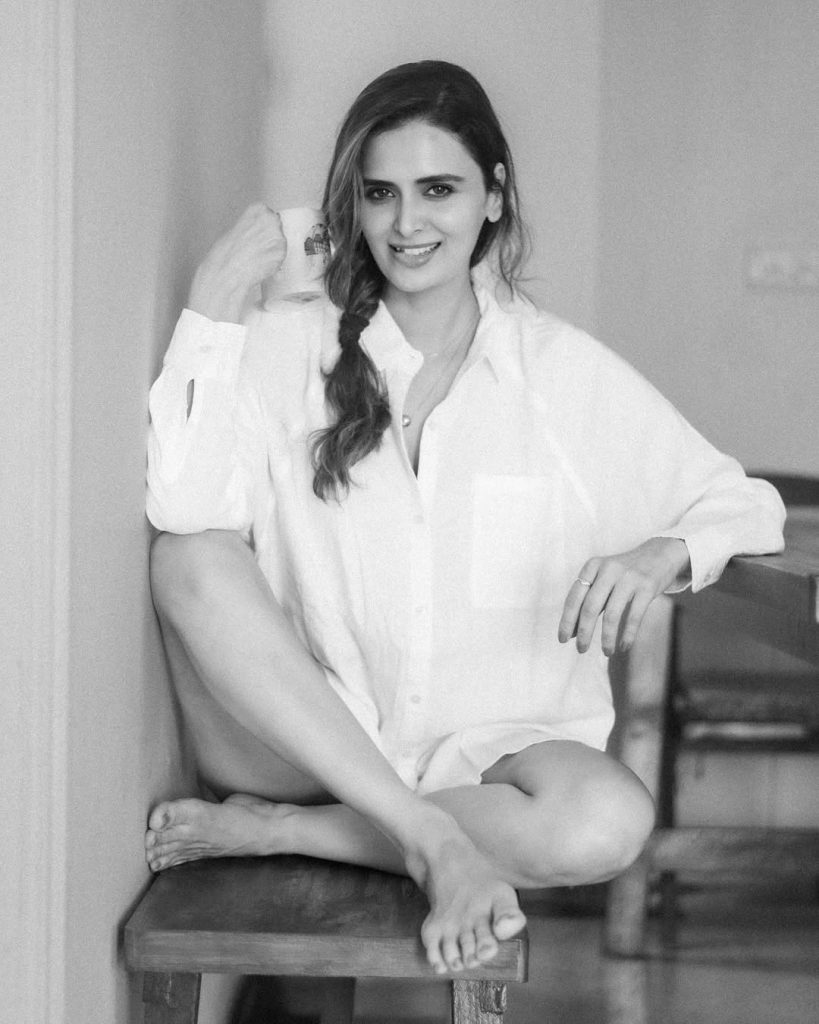 Classic white button-down showcases Meenakshi Dixit's timeless wardrobe essentials