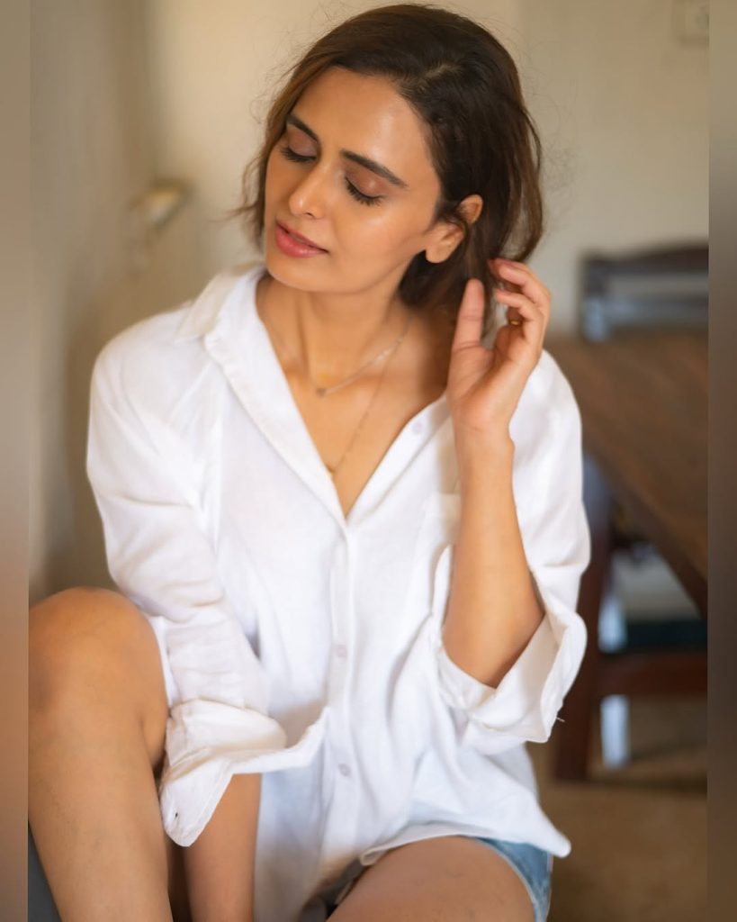 Classic white button-down showcases Meenakshi Dixit's timeless wardrobe essentials