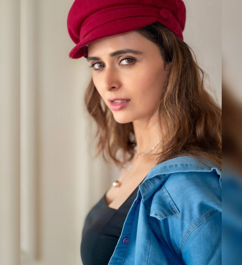 Contemporary shorts dress styling reflects Meenakshi Dixit's modern fashion sensibilities
