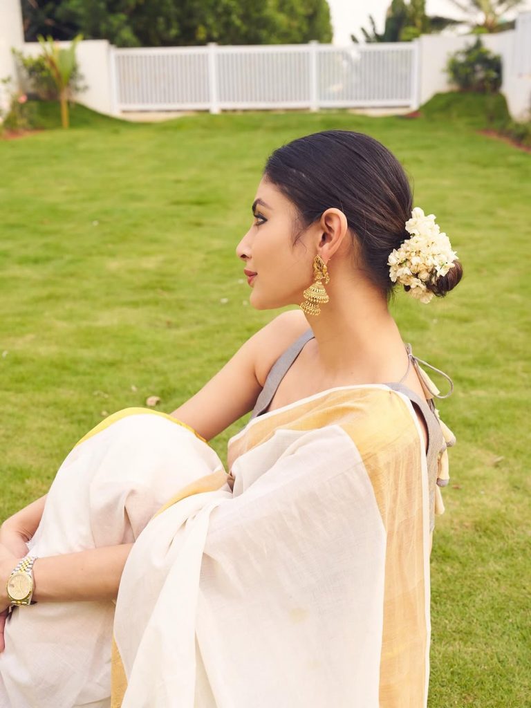 Pure white saree creates ethereal elegance in Mouni Roy's traditional portrait