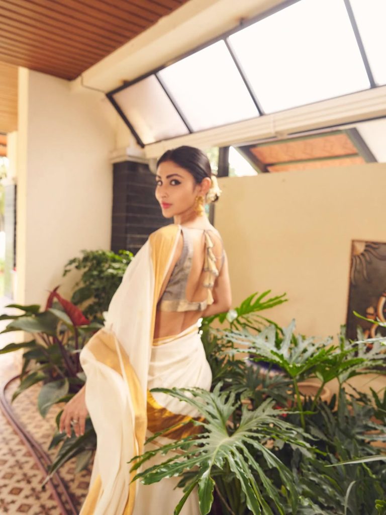 Pure white saree creates ethereal elegance in Mouni Roy's traditional portrait