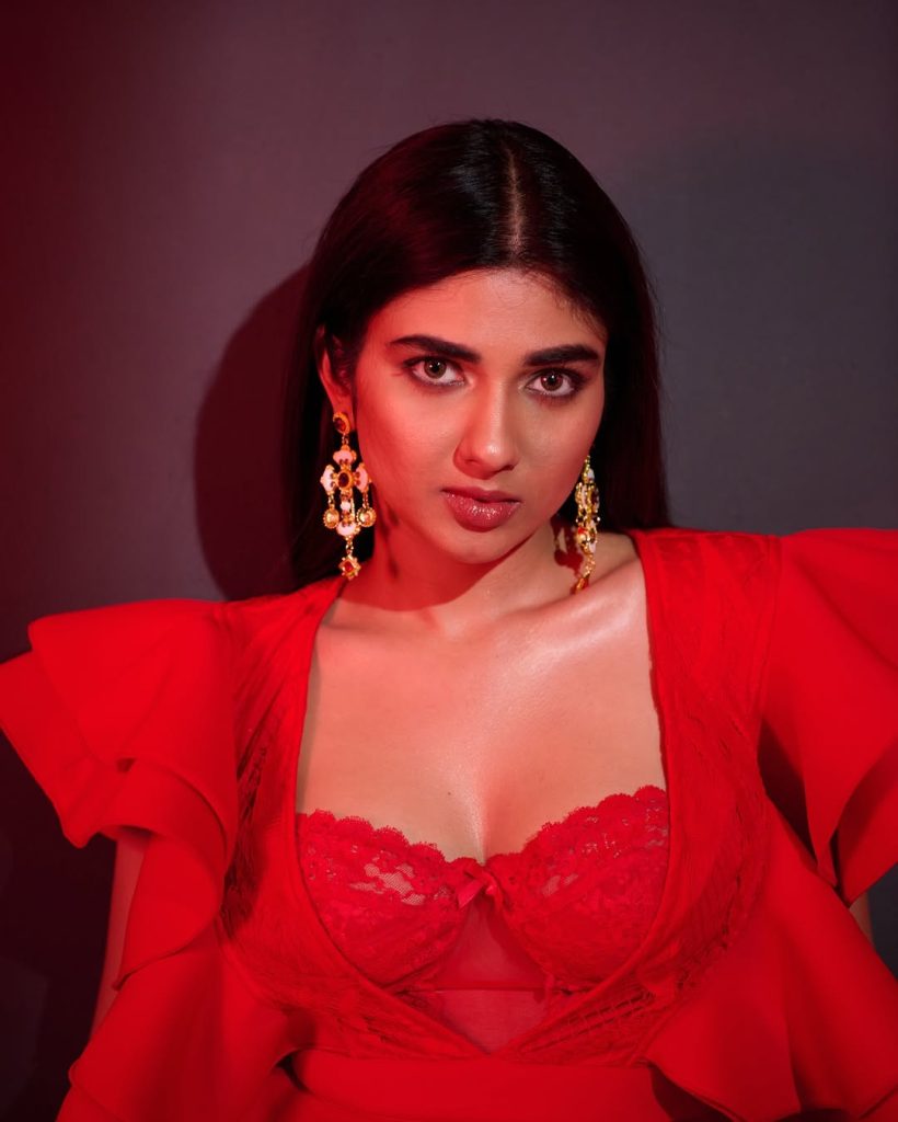 Red fabric catches light beautifully in Pragya Nagra's fashion portrait