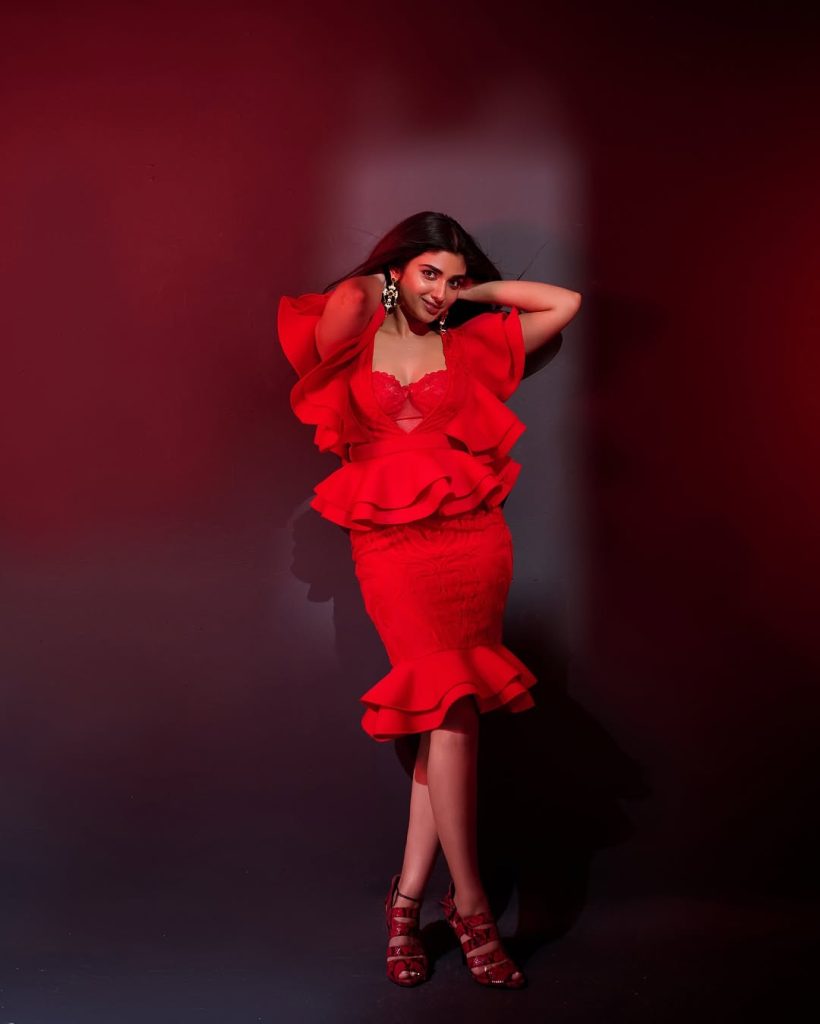 Red fabric catches light beautifully in Pragya Nagra's fashion portrait