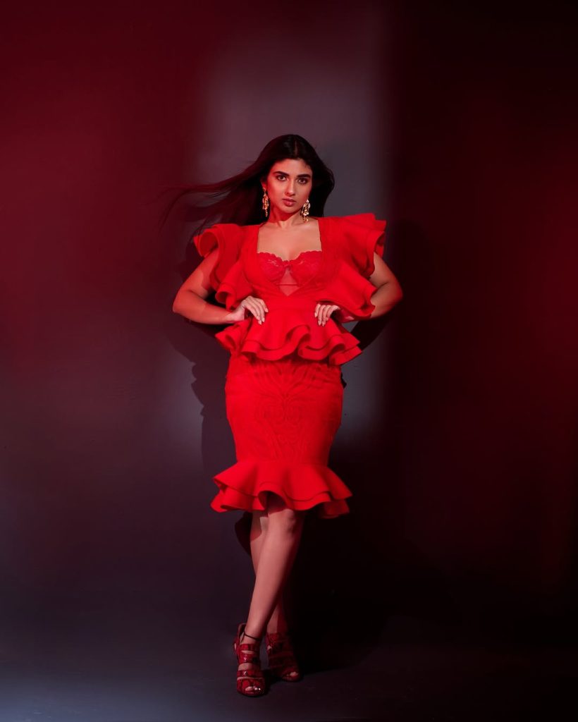Red fabric catches light beautifully in Pragya Nagra's fashion portrait