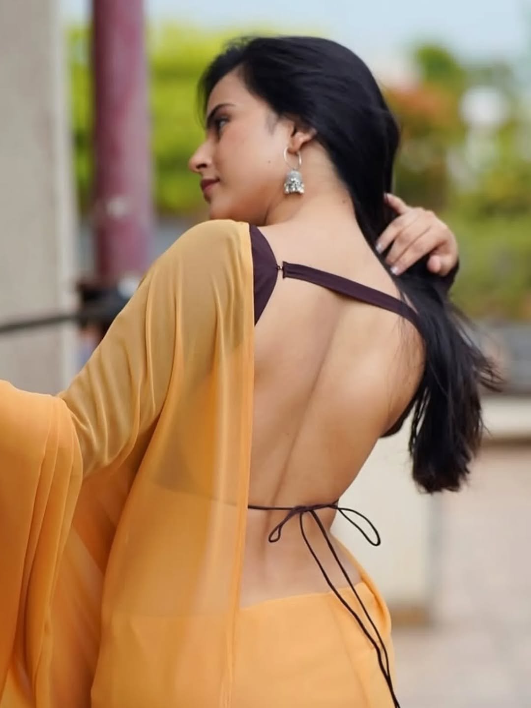 Pratiba Chaudhary in a yellow saree with brown blouse terrace portrait session (1)