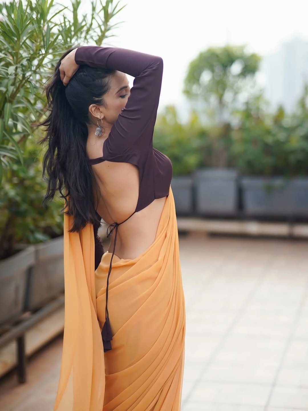 Pratiba Chaudhary in a yellow saree with brown blouse terrace portrait session (11)