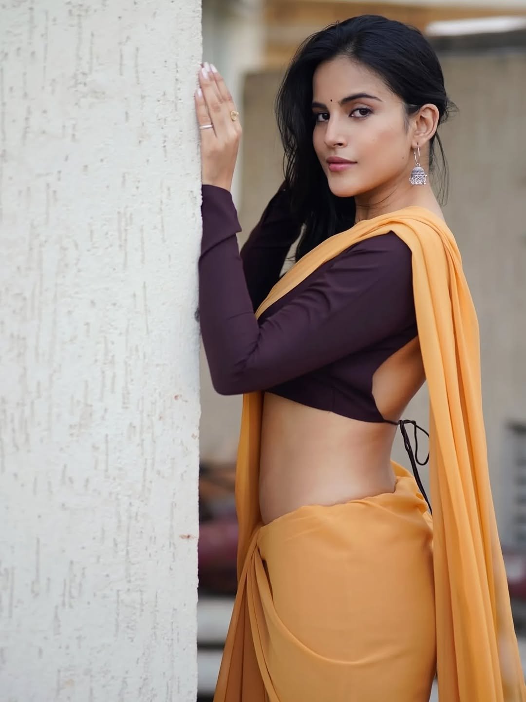 Pratiba Chaudhary in a yellow saree with brown blouse terrace portrait session (5)
