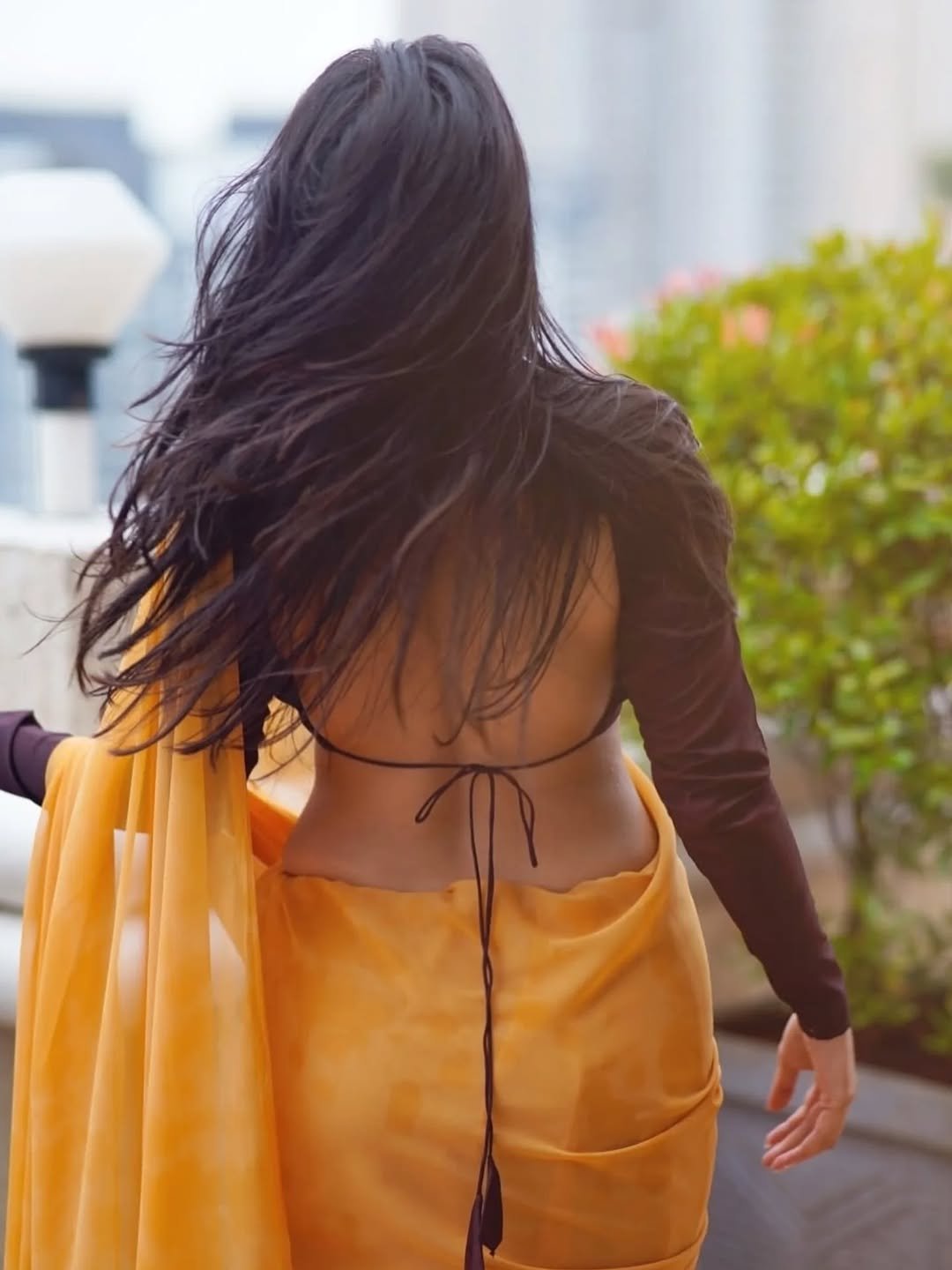 Pratiba Chaudhary in a yellow saree with brown blouse terrace portrait session (9)