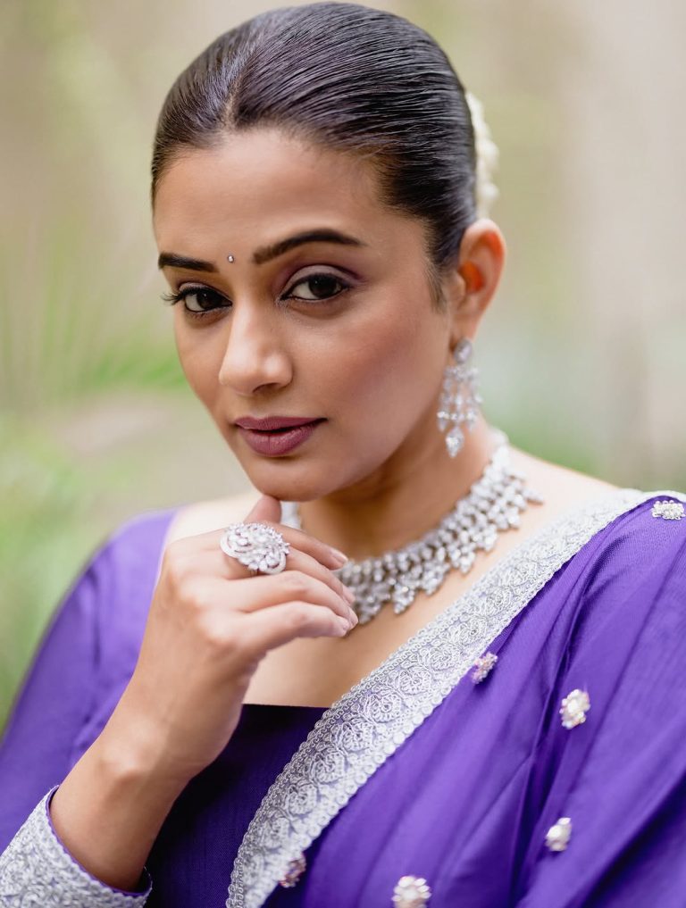 Charming blue chudidhar reflects Priyamani's enduring traditional appeal