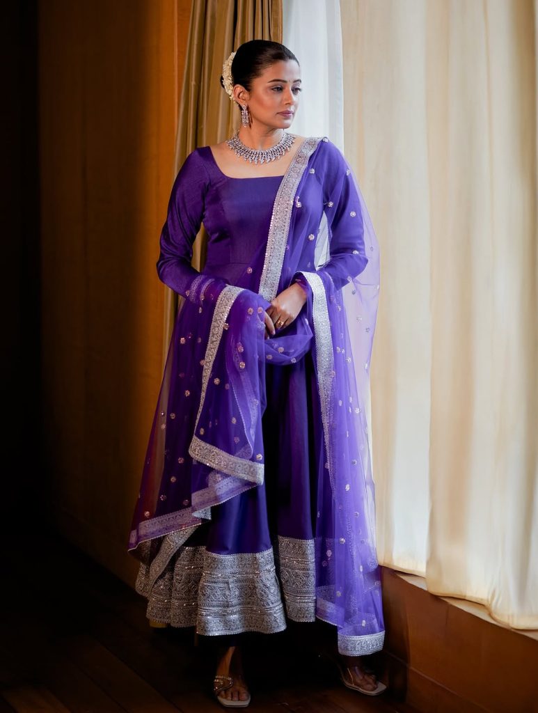 Soft blue traditional wear creates gentle, approachable styling statement for Priyamani