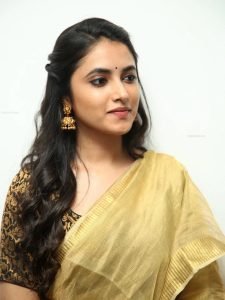 Traditional golden styling showcased through Priyanka Arul Mohan's closeup photography