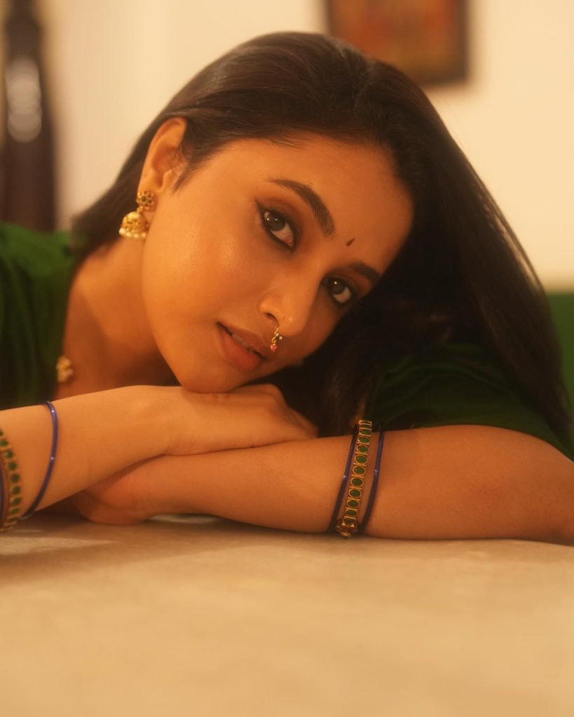 Natural green tones create serene backdrop for Priyanka Mohan's portrait