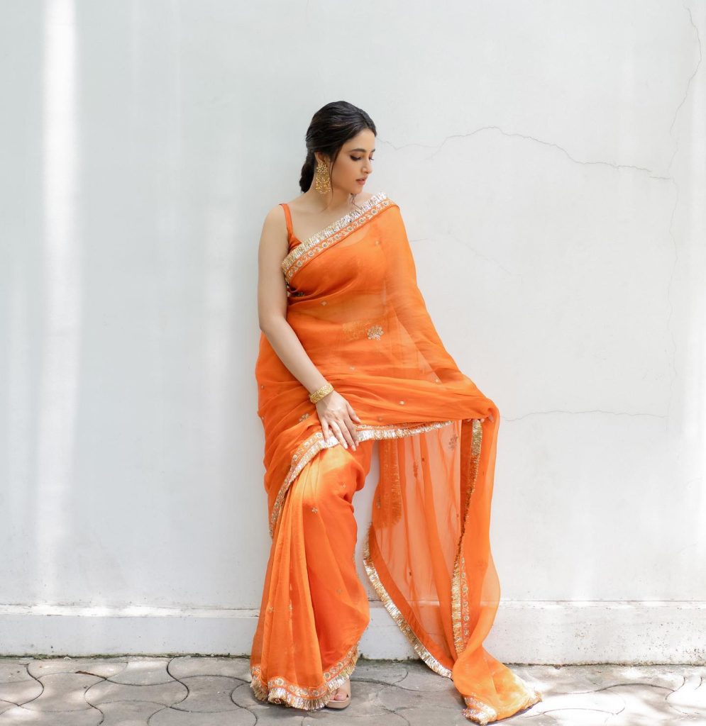 Stunning orange hues complement Priyanka Mohan's radiant complexion