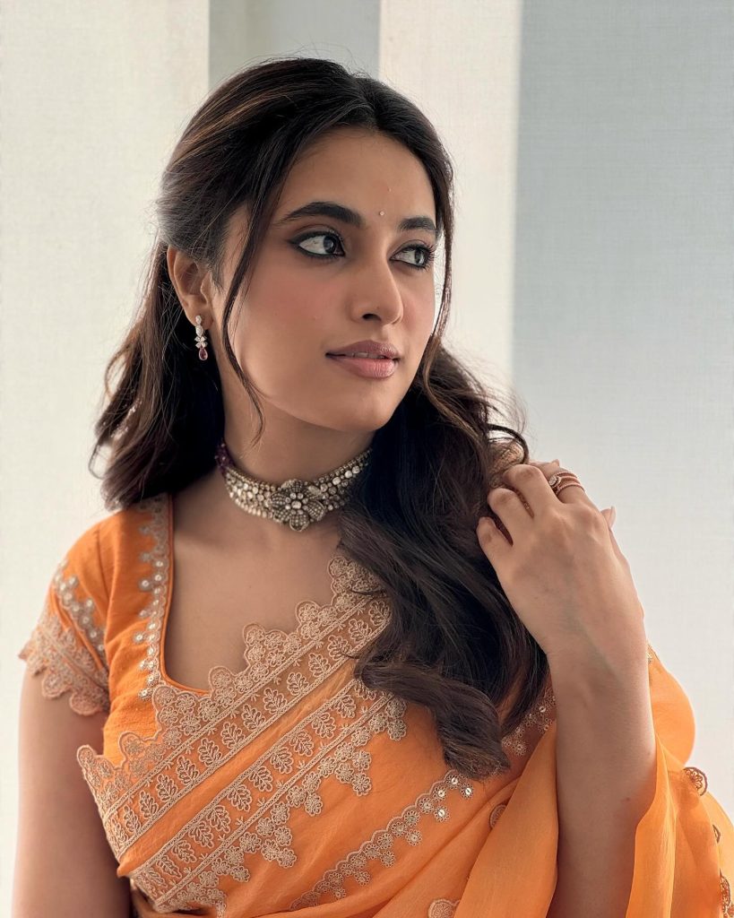 Priyanka Mohan's gorgeous styling features intricate orange fabric patterns