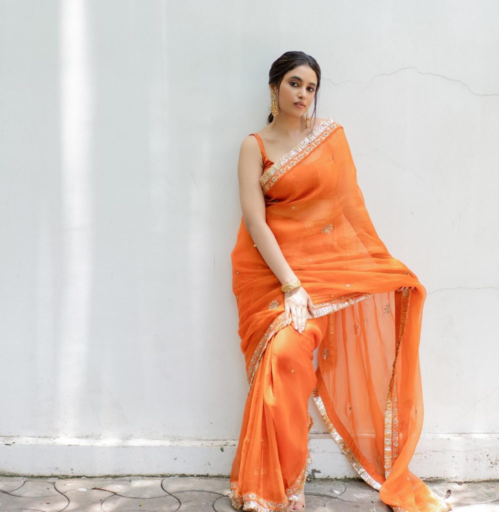 Stunning orange hues complement Priyanka Mohan's radiant complexion