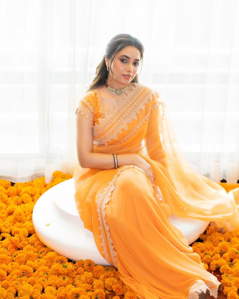 Priyanka Mohan's gorgeous styling features intricate orange fabric patterns