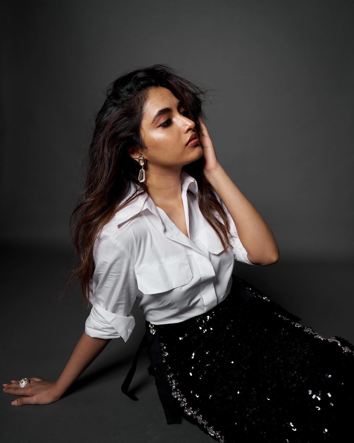 Chic monochrome styling demonstrates Priyanka Mohan's sophisticated fashion understanding