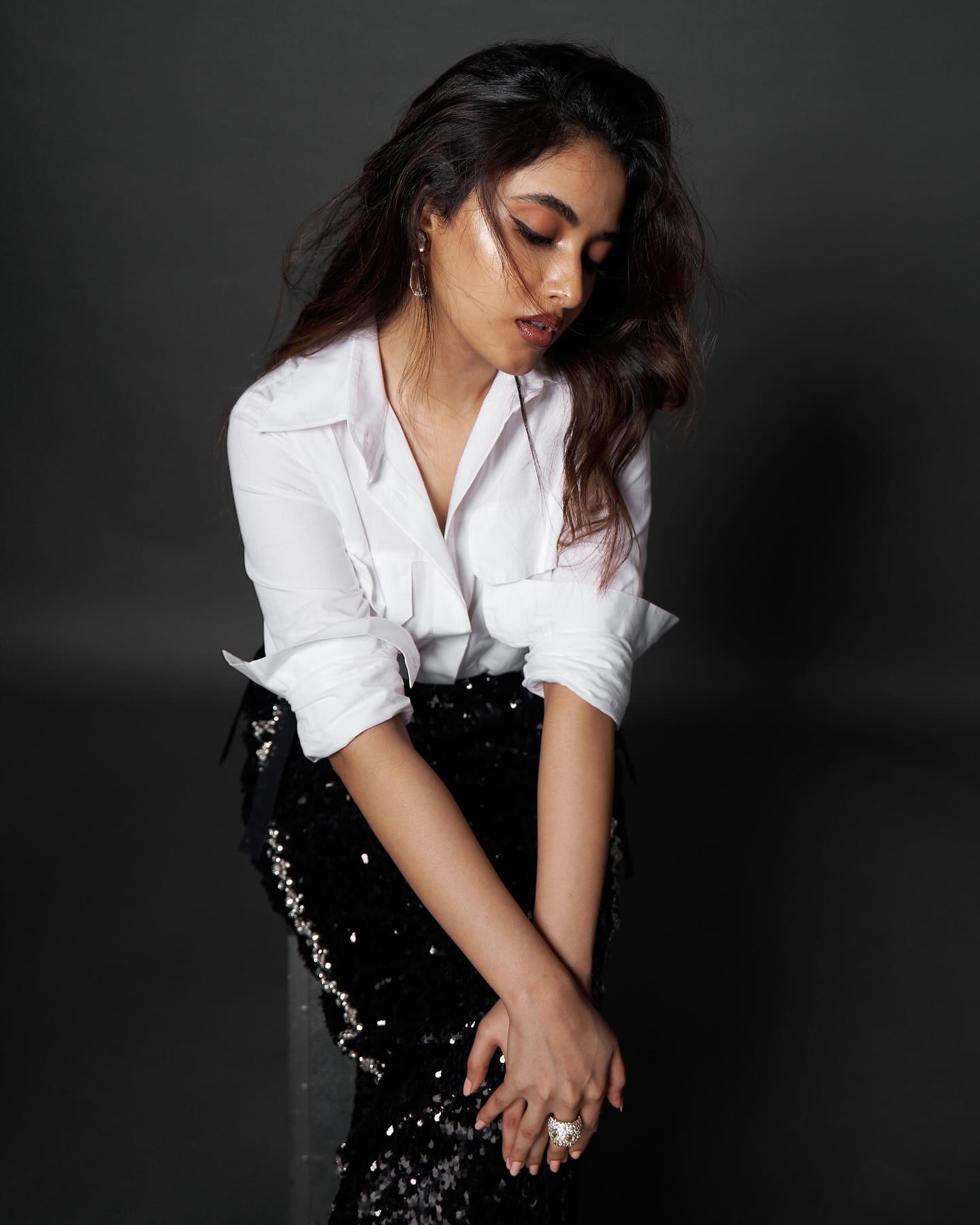 Chic monochrome styling demonstrates Priyanka Mohan's sophisticated fashion understanding