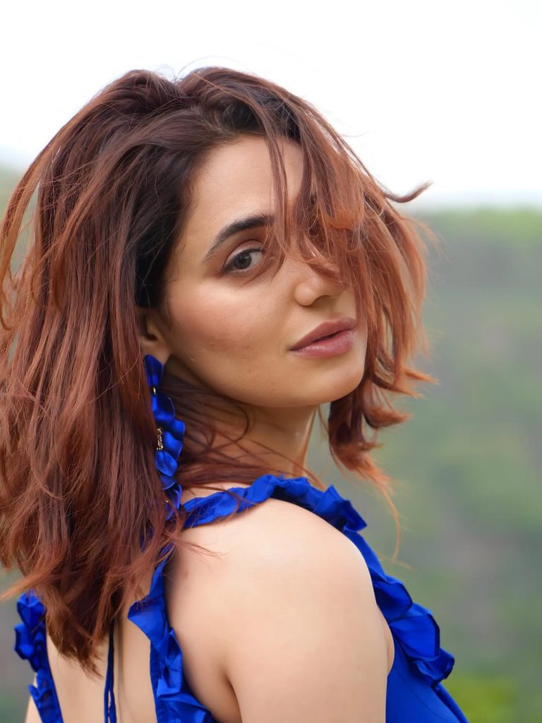Natural mountain setting enhances Priyanka Rewri's traditional blue ensemble