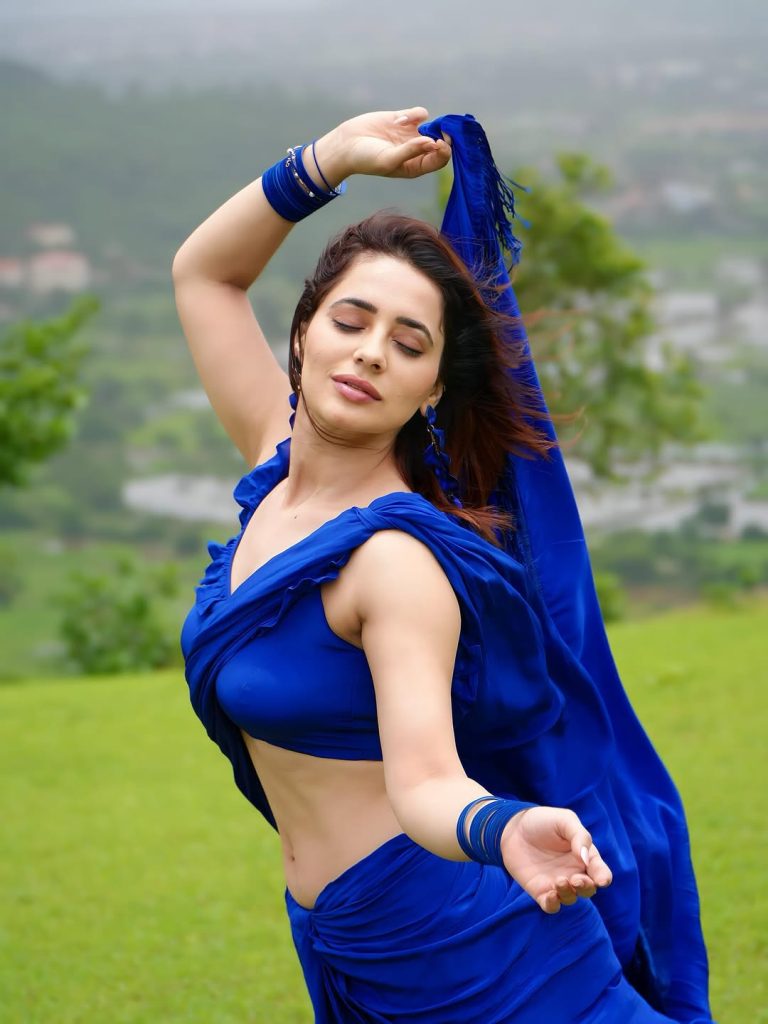Natural mountain setting enhances Priyanka Rewri's traditional blue ensemble