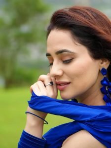 Natural mountain setting enhances Priyanka Rewri's traditional blue ensemble