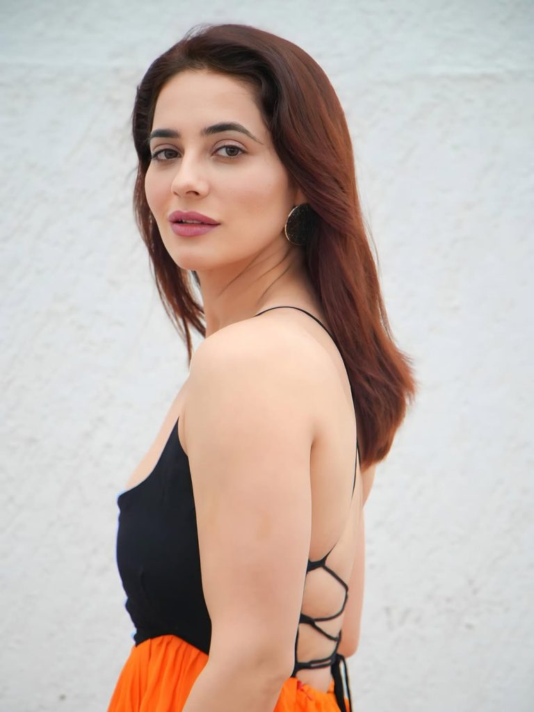 Priyanka Rewri embodies glamour in contemporary black orange ensemble
