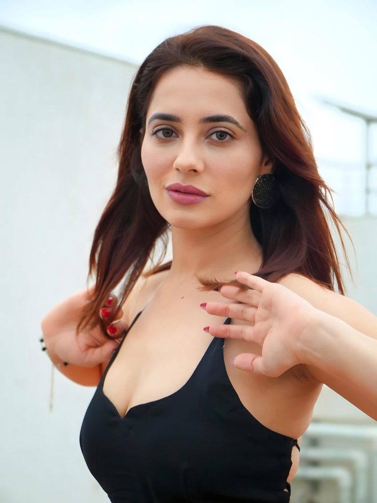 Priyanka Rewri embodies glamour in contemporary black orange ensemble