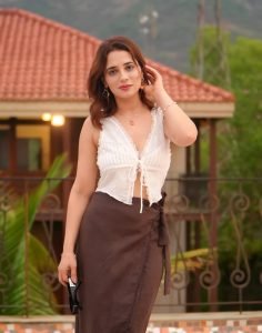 Fashion-forward crop top styling showcases Priyanka Rewri's modern appeal