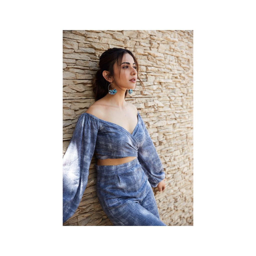 Glamorous portrait showcasing Rakul's sophisticated evening wear styling