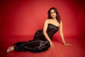 Reba Monica John embodies sophisticated elegance in striking black dress ensemble
