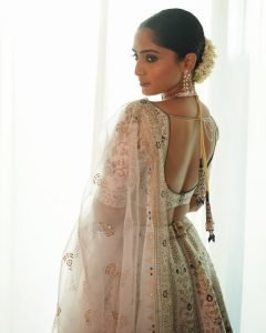 Pure wedding elegance captured in Reba Monica John's golden lehenga styling