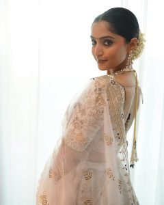 Reba Monica John embodies bridal beauty in stunning golden lehenga ensemble