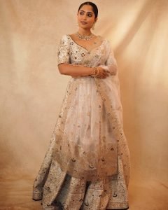 Reba Monica John embodies bridal beauty in stunning golden lehenga ensemble