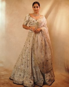 Pure wedding elegance captured in Reba Monica John's golden lehenga styling