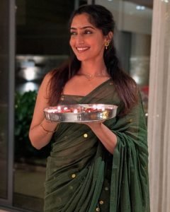 Reba Monica John embodies passion for traditional wear in striking green saree