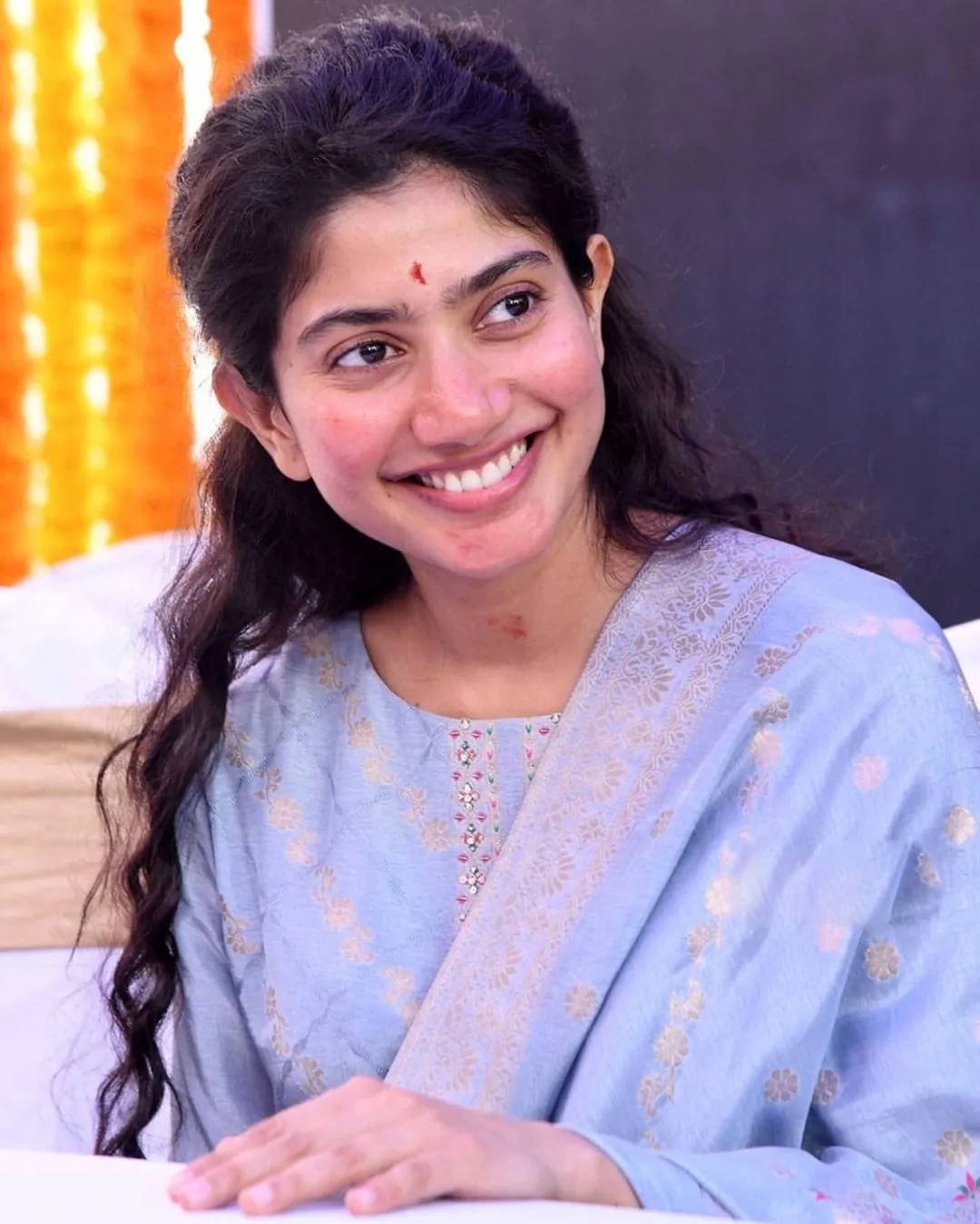Professional event appearance showcases Sai Pallavi's media engagement skills