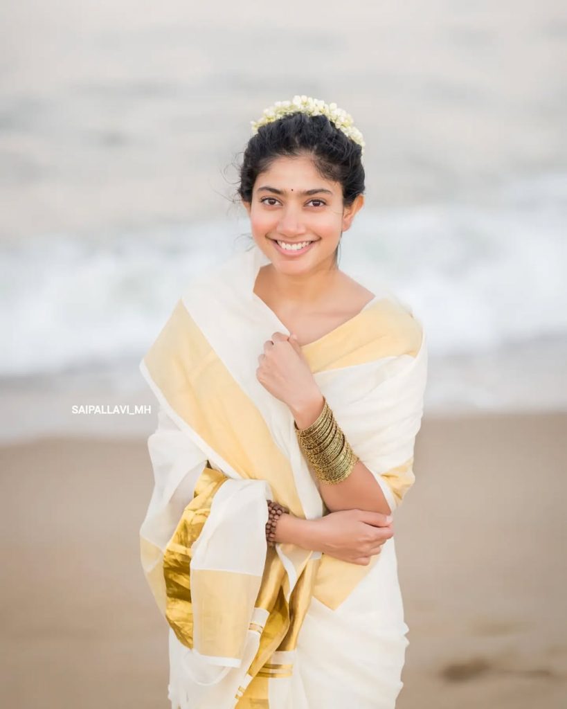 Beach setting creates natural backdrop for Sai Pallavi's white saree styling