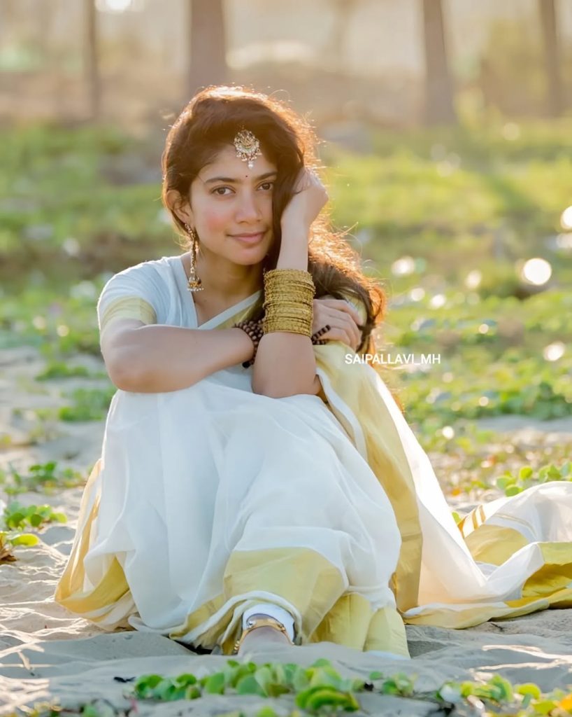 Beach setting creates natural backdrop for Sai Pallavi's white saree styling