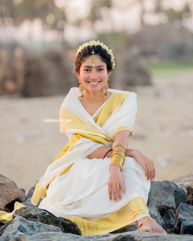 Sai Pallavi embodies grace in white saree with oceanic environment