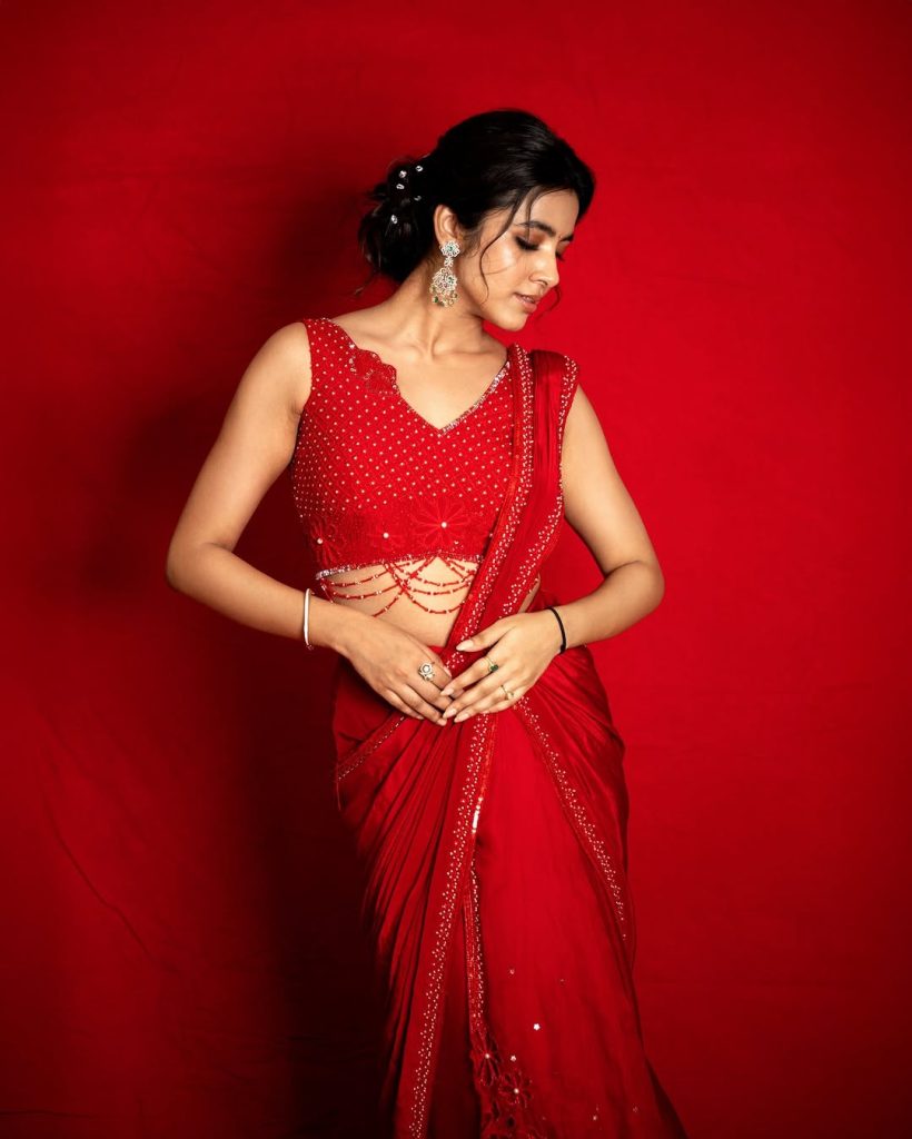 Bold red styling creates powerful visual impact for Shivani Nagaram's glamorous shoot