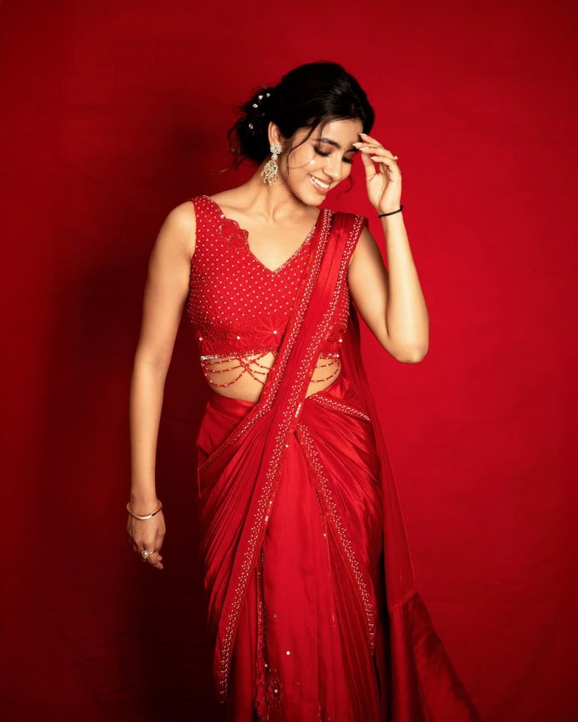 Dramatic red color choice emphasizes Shivani Nagaram's fearless fashion approach