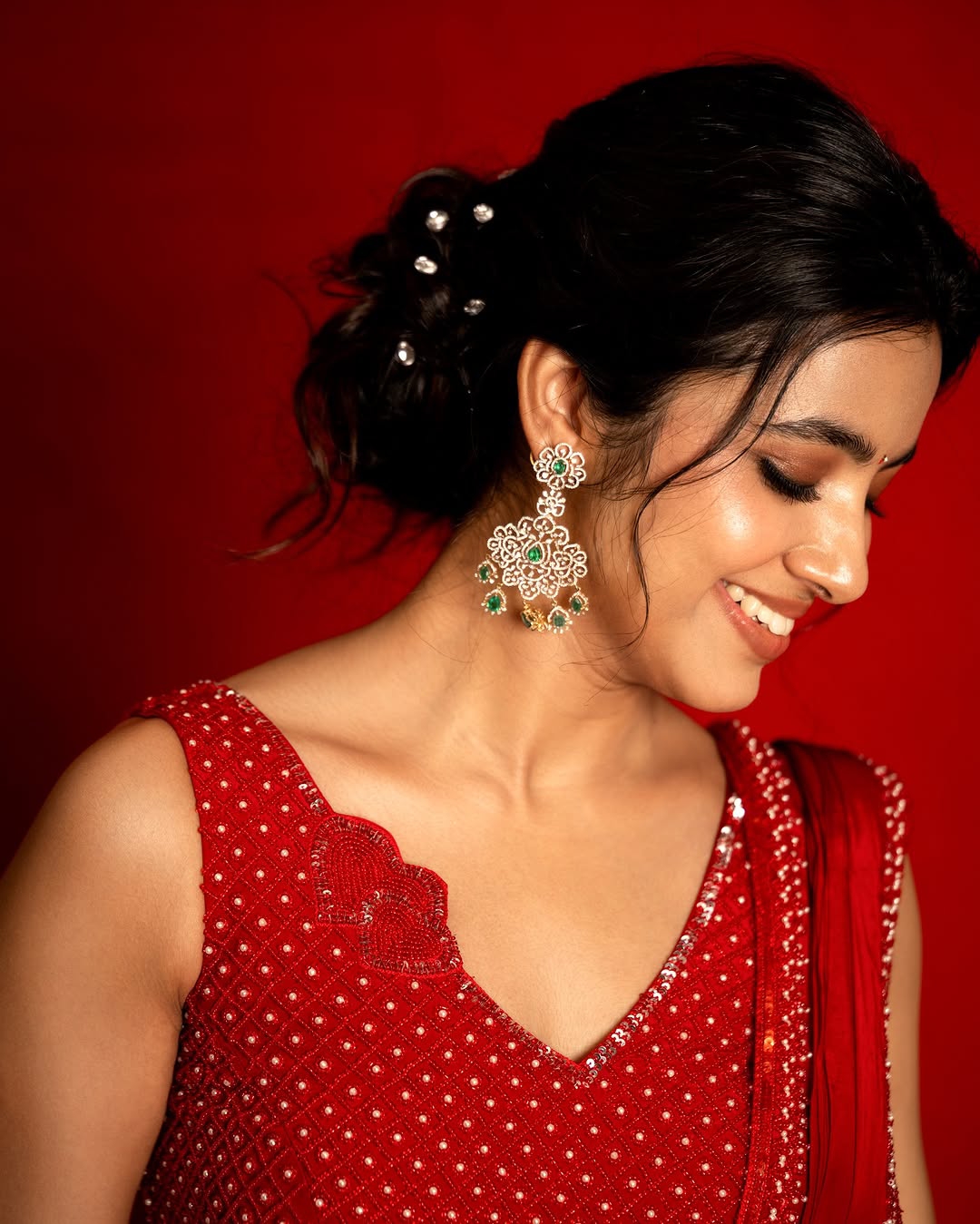 Bold red styling creates powerful visual impact for Shivani Nagaram's glamorous shoot