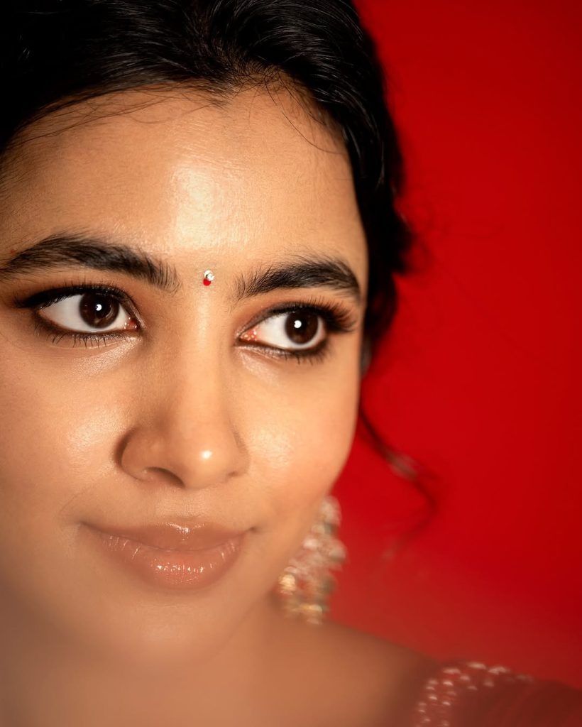 Bold red styling creates powerful visual impact for Shivani Nagaram's glamorous shoot
