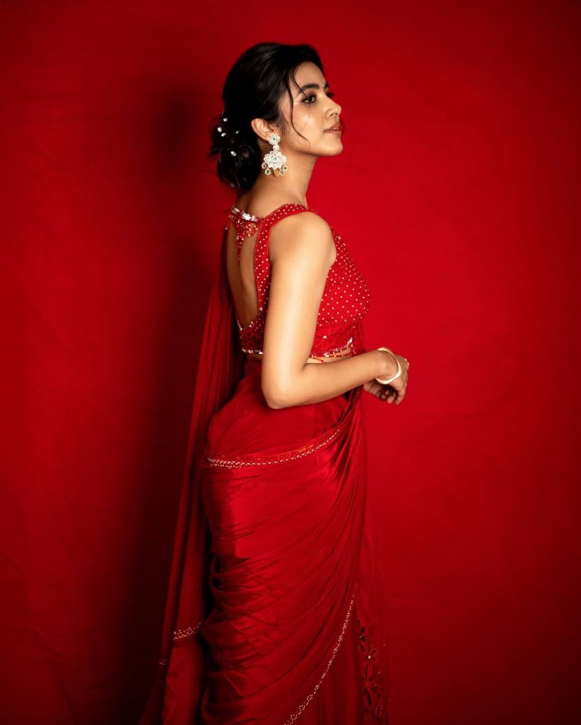 Shivani Nagaram radiates confidence in striking red hot ensemble