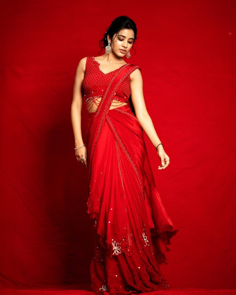 Shivani Nagaram radiates confidence in striking red hot ensemble