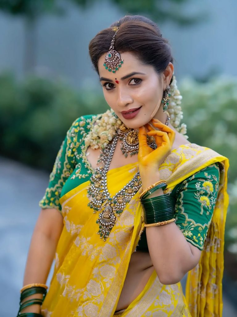 Beautiful yellow draping showcases Shobha Shetty's traditional fashion expertise